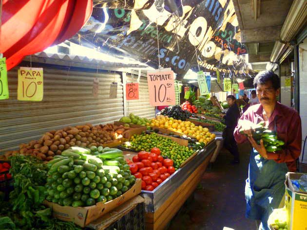 Fresh fruits and vegetables on display at Los Globos open air market in Ensenada, Baja California Norte, Mexico.